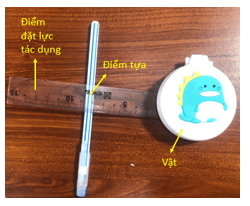 Dùng các dụng cụ học tập thiết kế phương án và tiến hành thí nghiệm làm một đòn bẩy